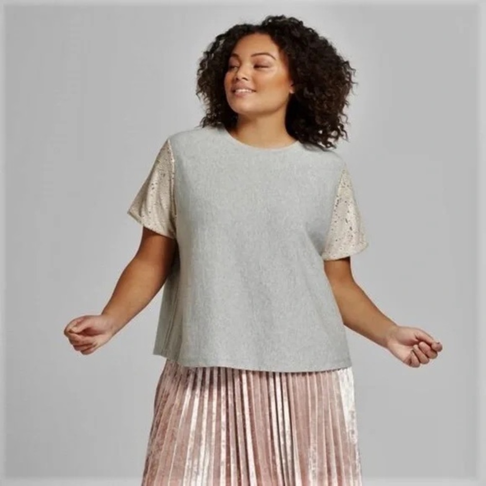 A New Day gray shirt with sequin sleeves. Size 3X. Shows normal wear